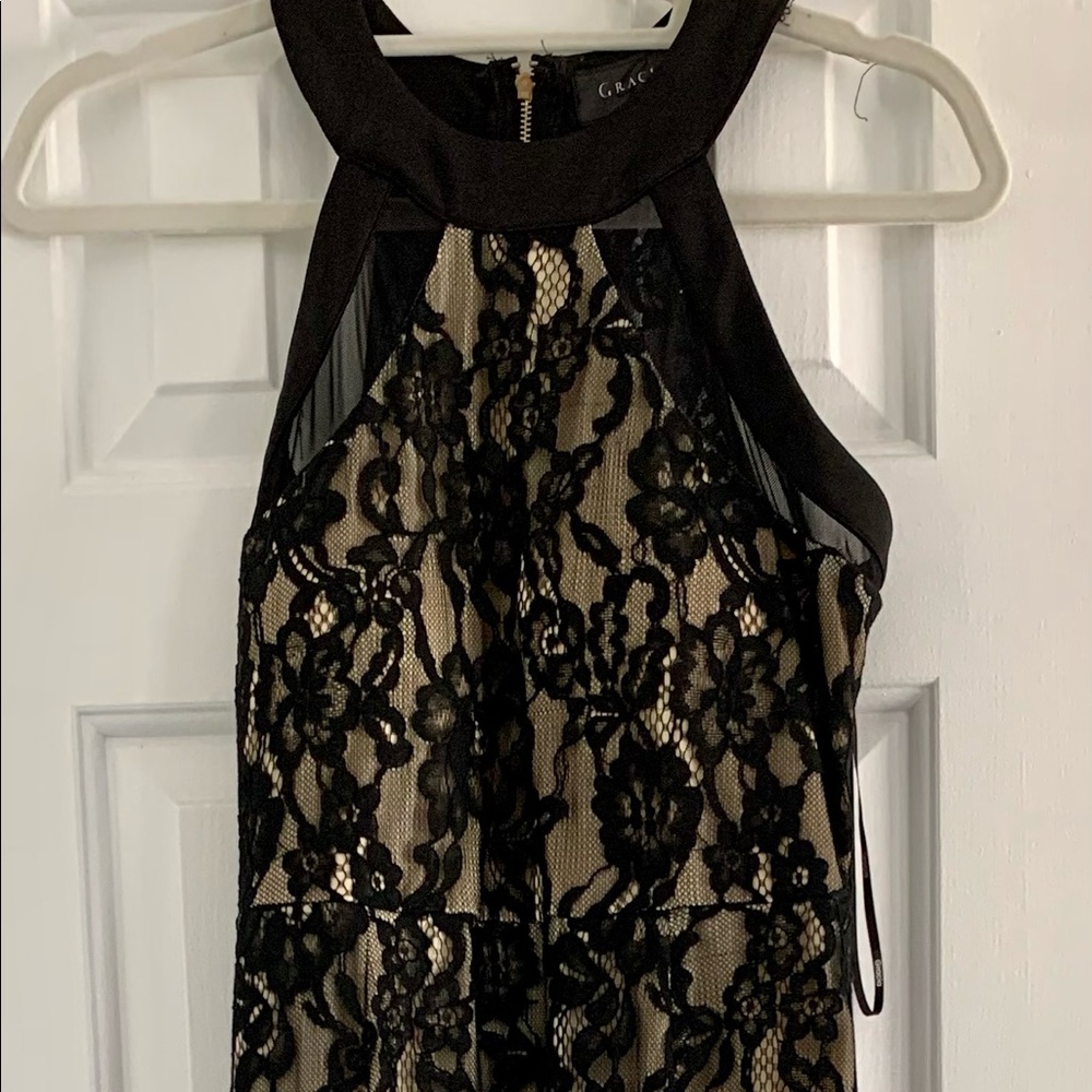 New without tags beautiful lace black evening dress.